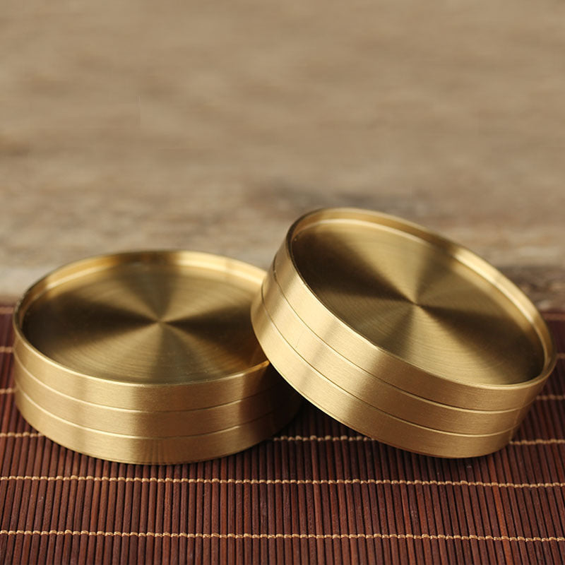 Six solid brass coaster for drinks.