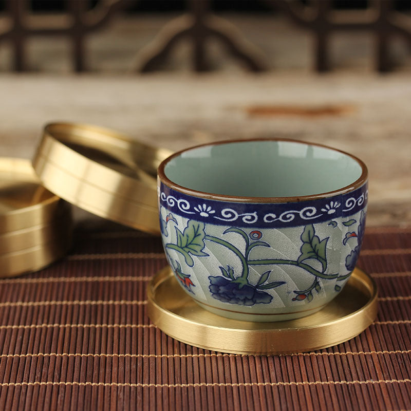 Solid brass coaster with tea cup.