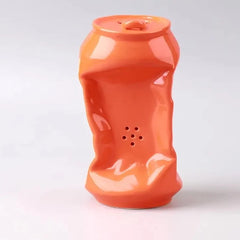 A ceramic orange soda can pipe.