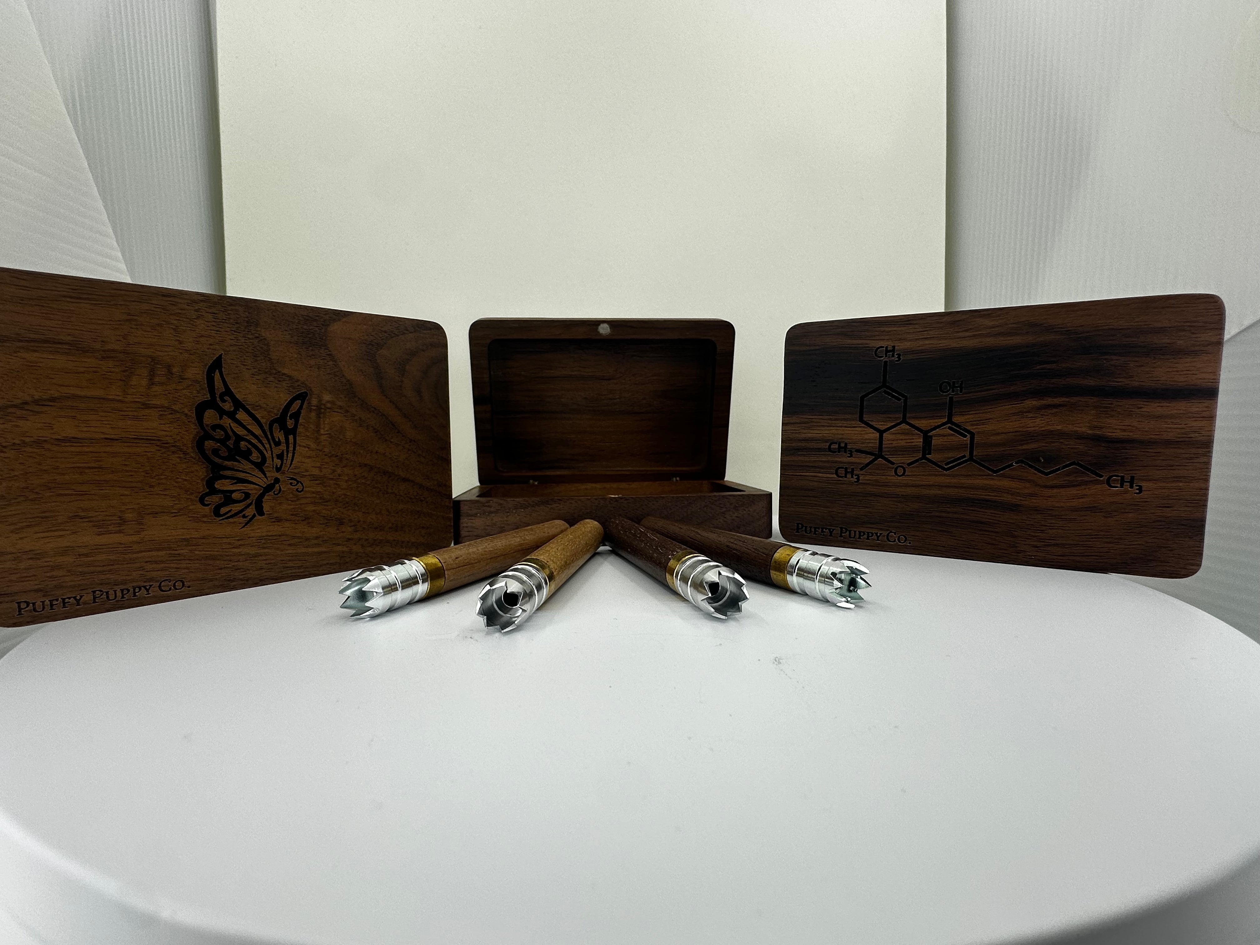Custom engraved wooden one hitters and stash cigarette case.