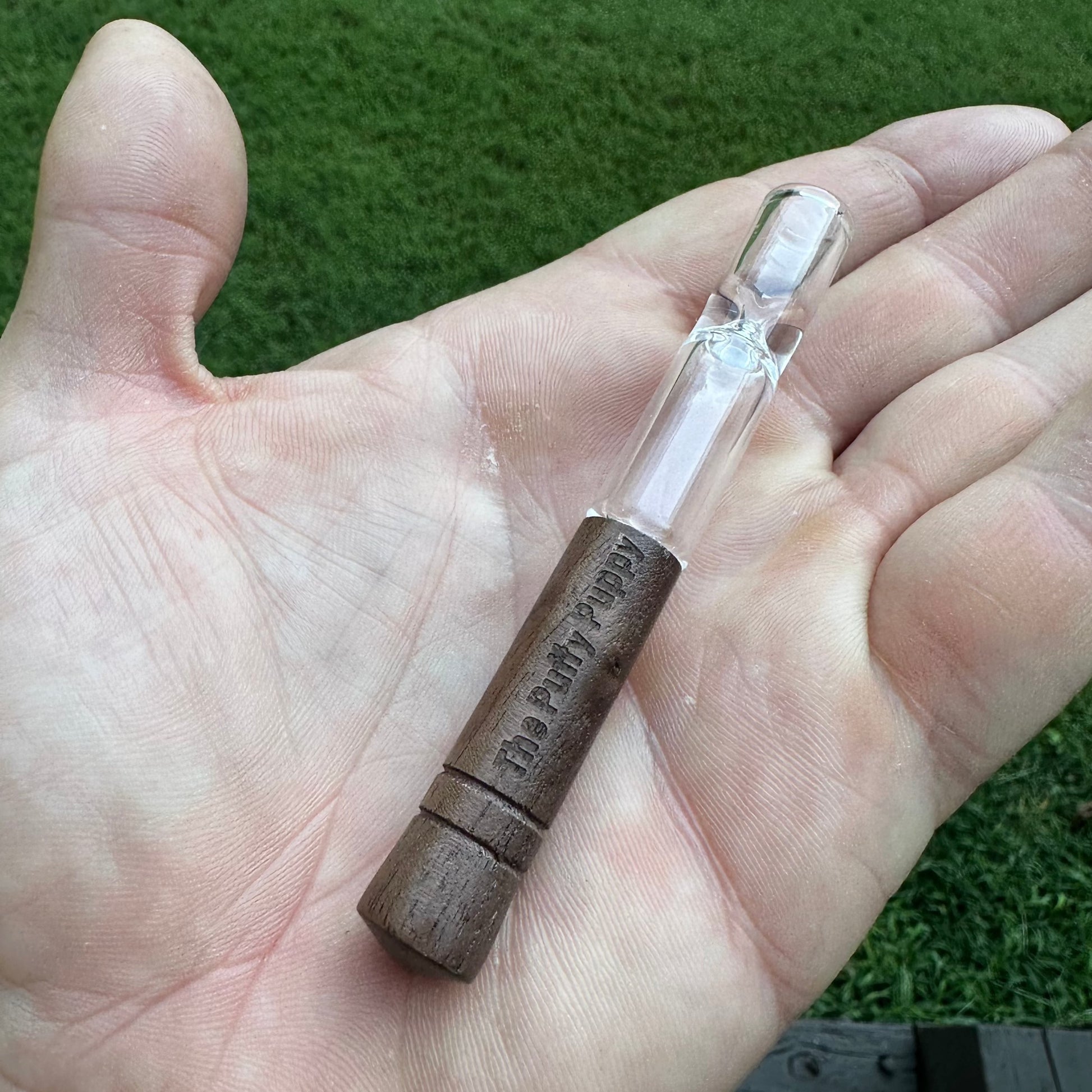Engraved tobacco glass pipe taster.