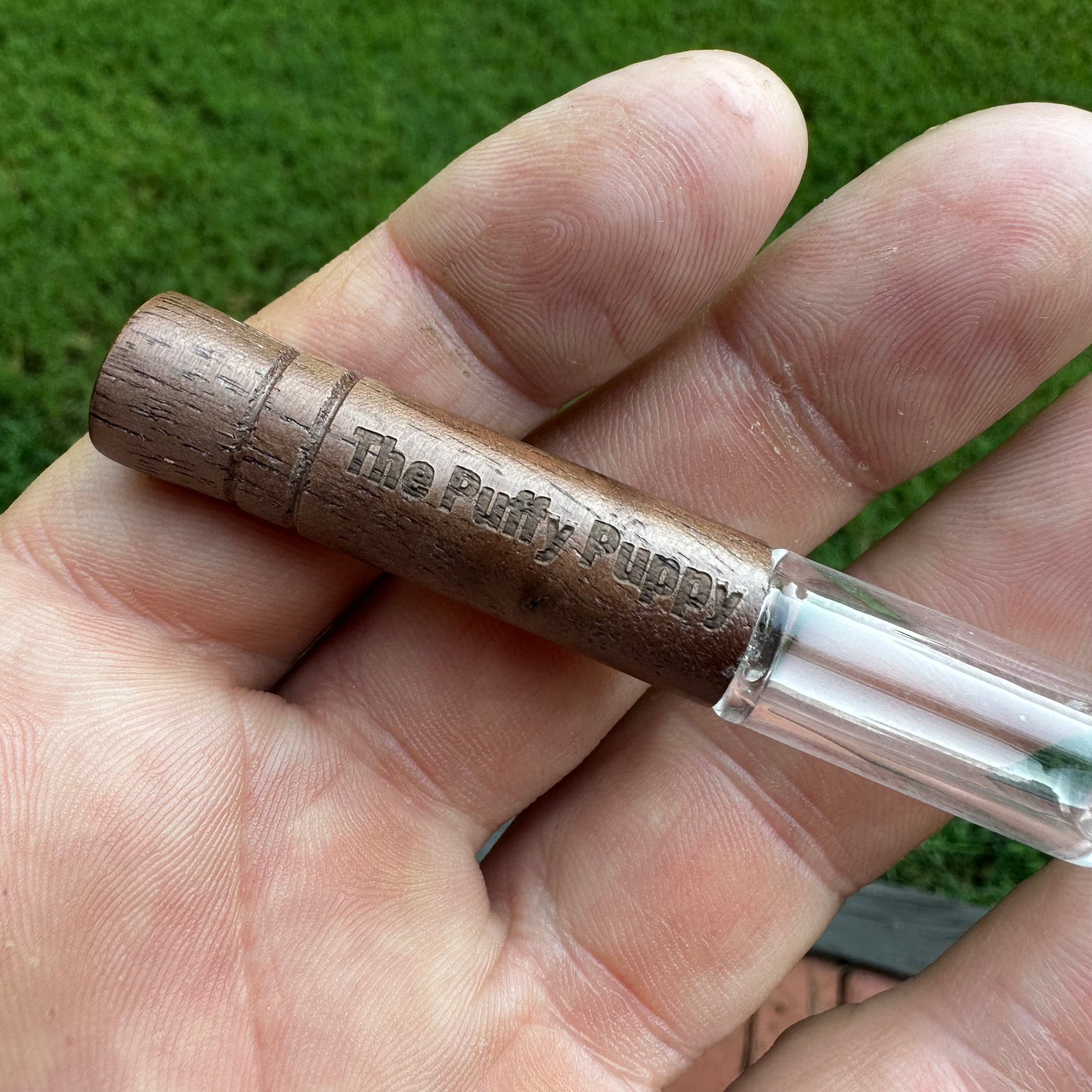 Engraved tobacco glass pipe taster.