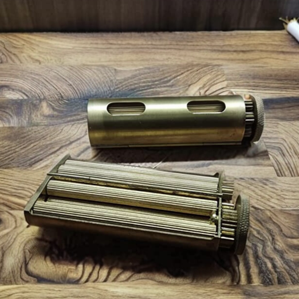 A brass rolling machine for weed joints.