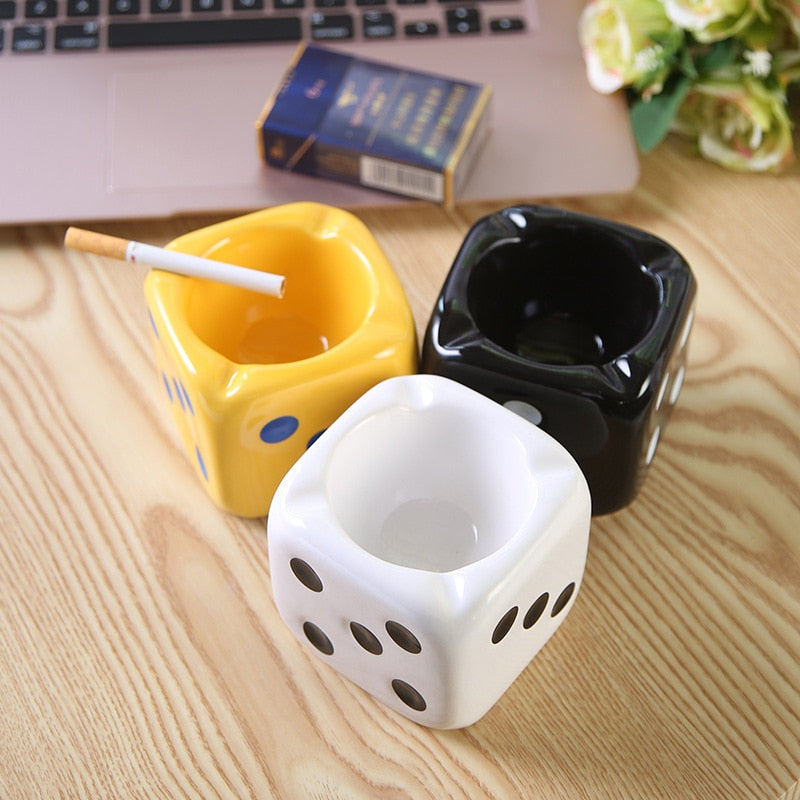 Square dice ashtray with yellow, white and black variation.