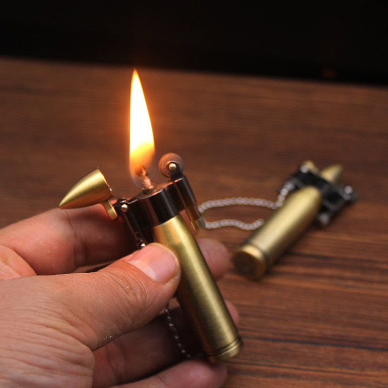 Brass bullet shaped kerosene steampunk lighter.
