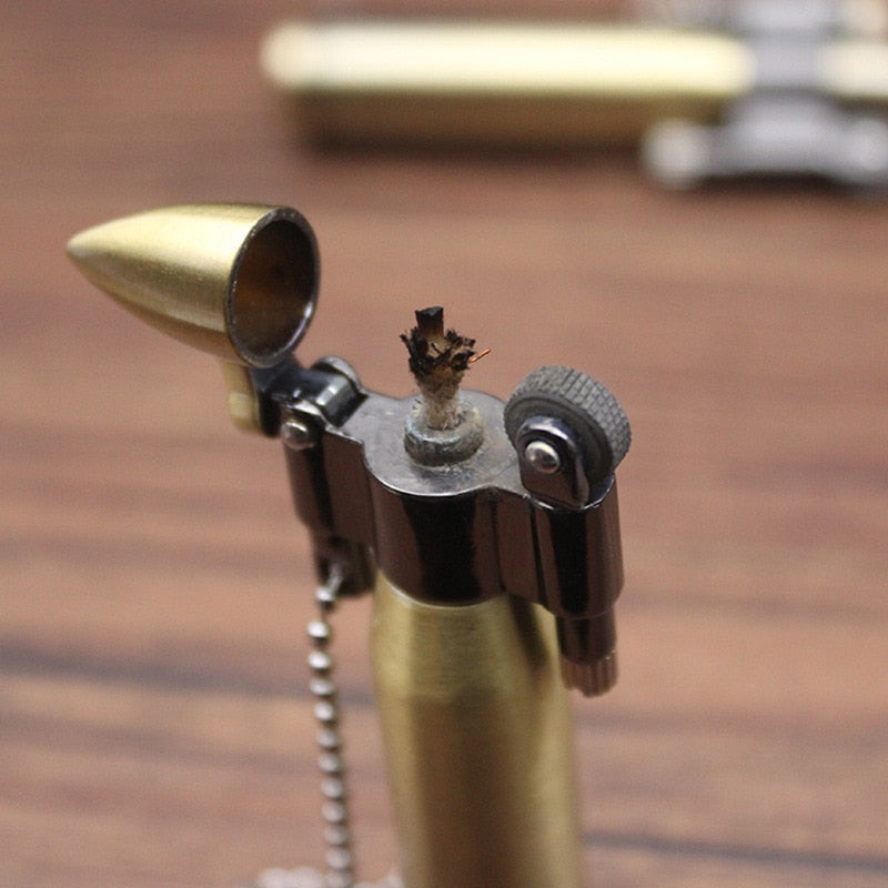 Brass bullet shaped kerosene steampunk lighter.