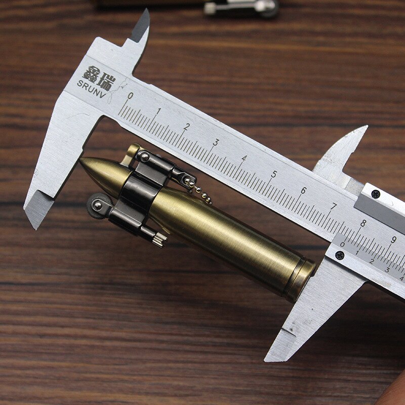 Brass bullet shaped kerosene steampunk lighter.