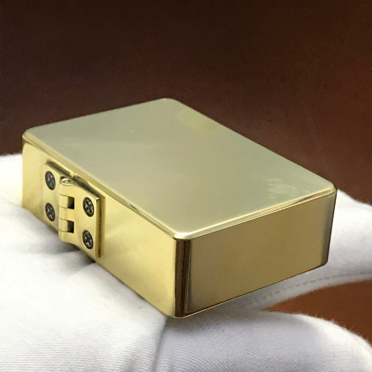 A gold copper heavy duty brass lighter.