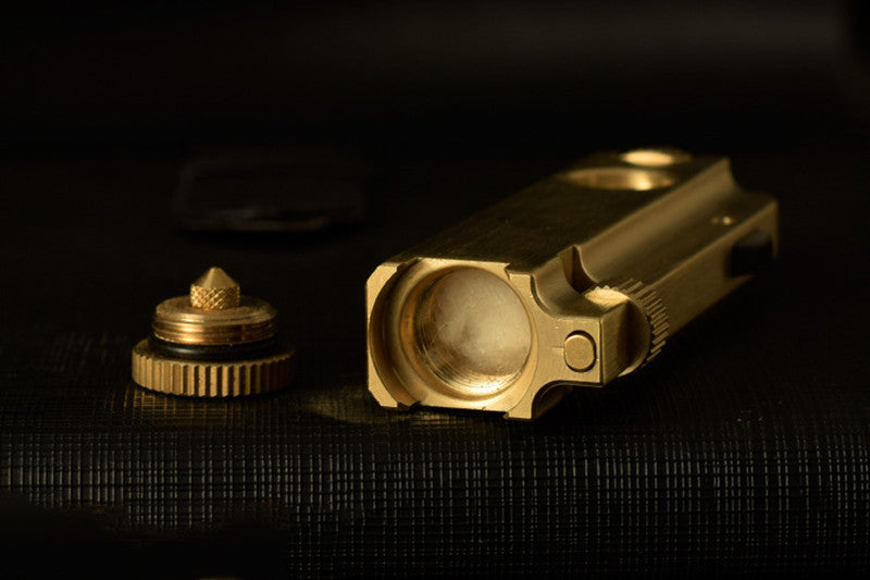 Parts of a copper brass lighter.