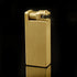 A gold brass heavy duty kerosene trench lighter.