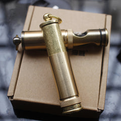 A vintage brass kerosene trench lighter with box.