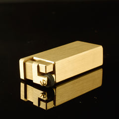 A gold heavy duty kerosene trench lighter.