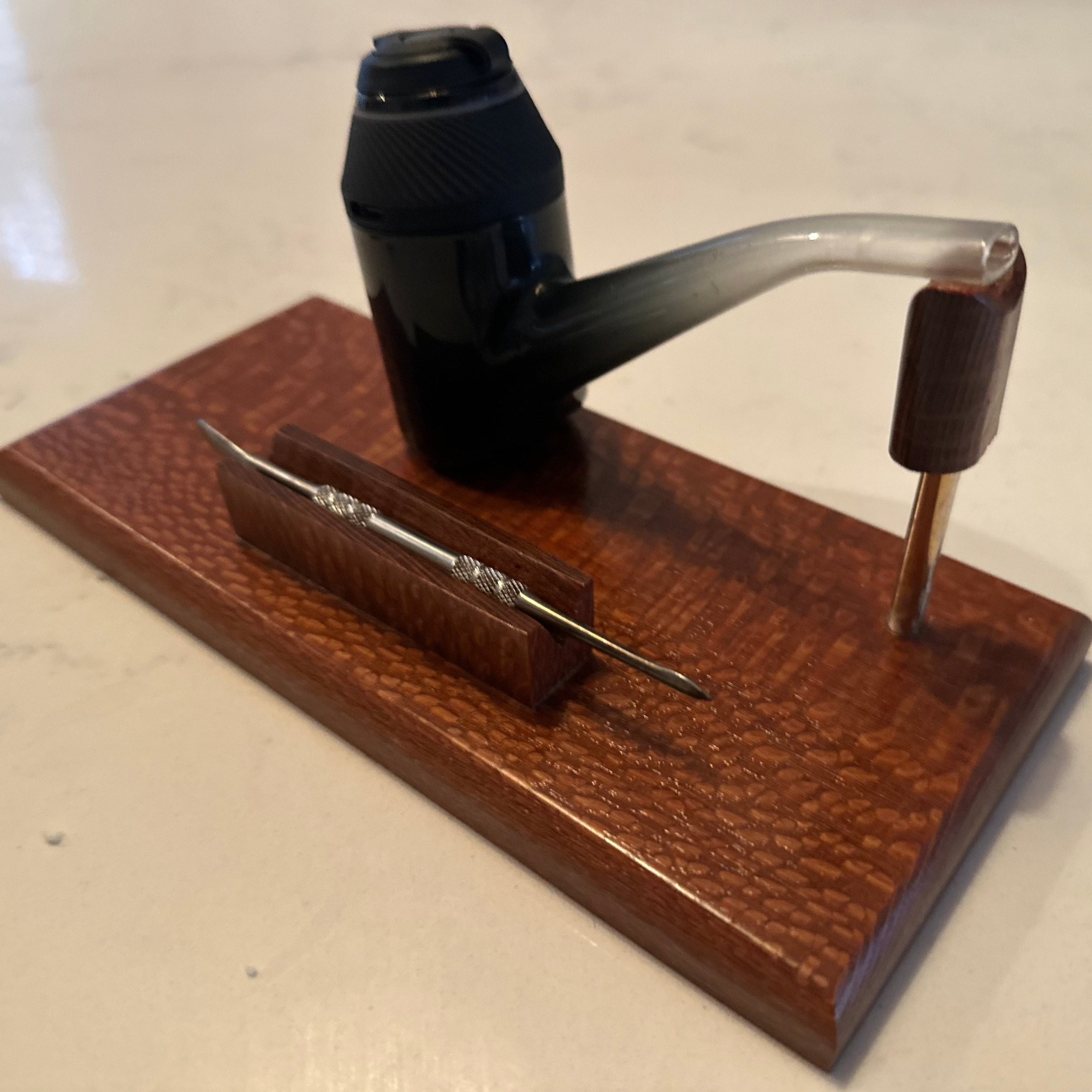 Wooden dab holder stand and pipe holder.